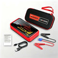 2026 New Smart Jump Starter in a red-and-black casing with digital display, zip case, charging cable, and jumper clamps