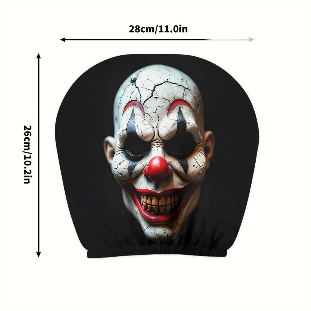 2pcs Clown Print Car headrest cover in black polyester, featuring a cracked white clown face with a red nose
