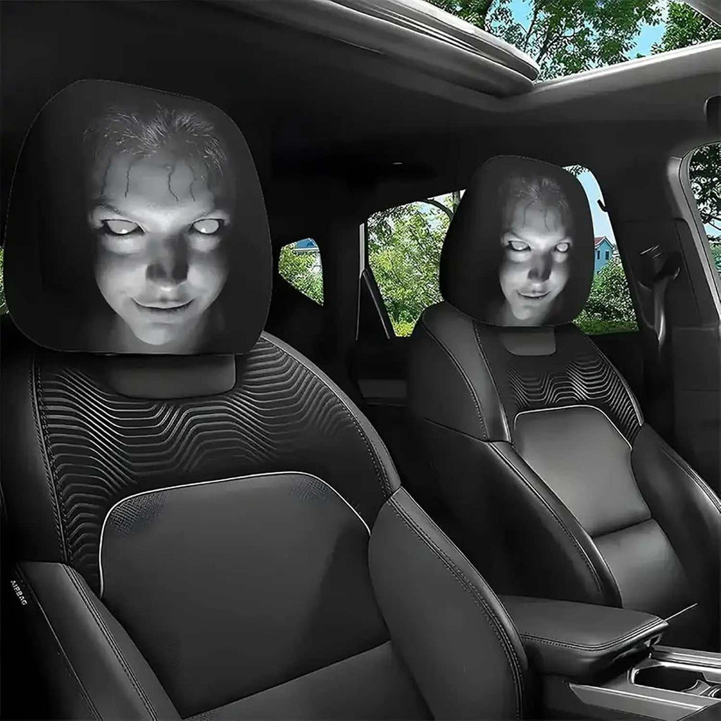 2Pcs Horror Design Car Headrest Covers in black polyester feature eerie gray faces with glowing white eyes