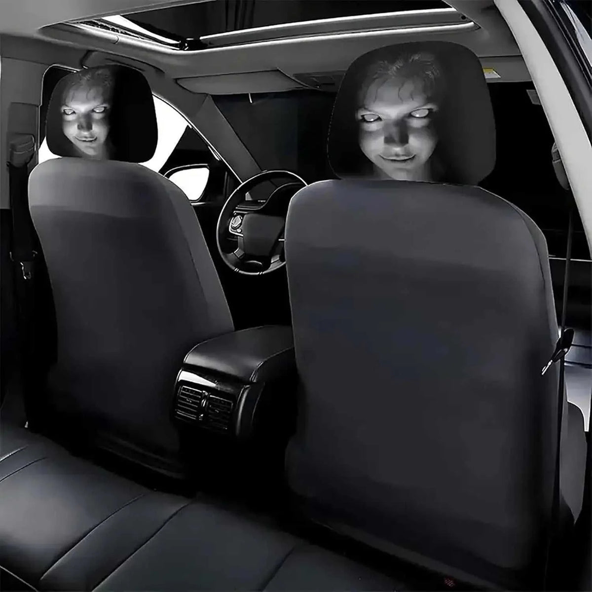 2Pcs Horror Design Car Headrest Covers in black with eerie grayscale faces printed on the headrest area