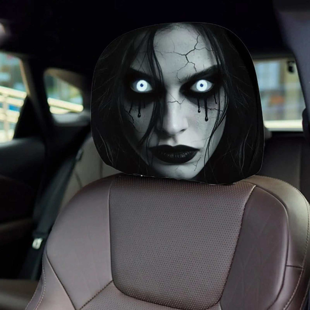 2pcs Scary Headrest Cover with a pale horror face, glowing blue eyes, black hair and dark tear streaks