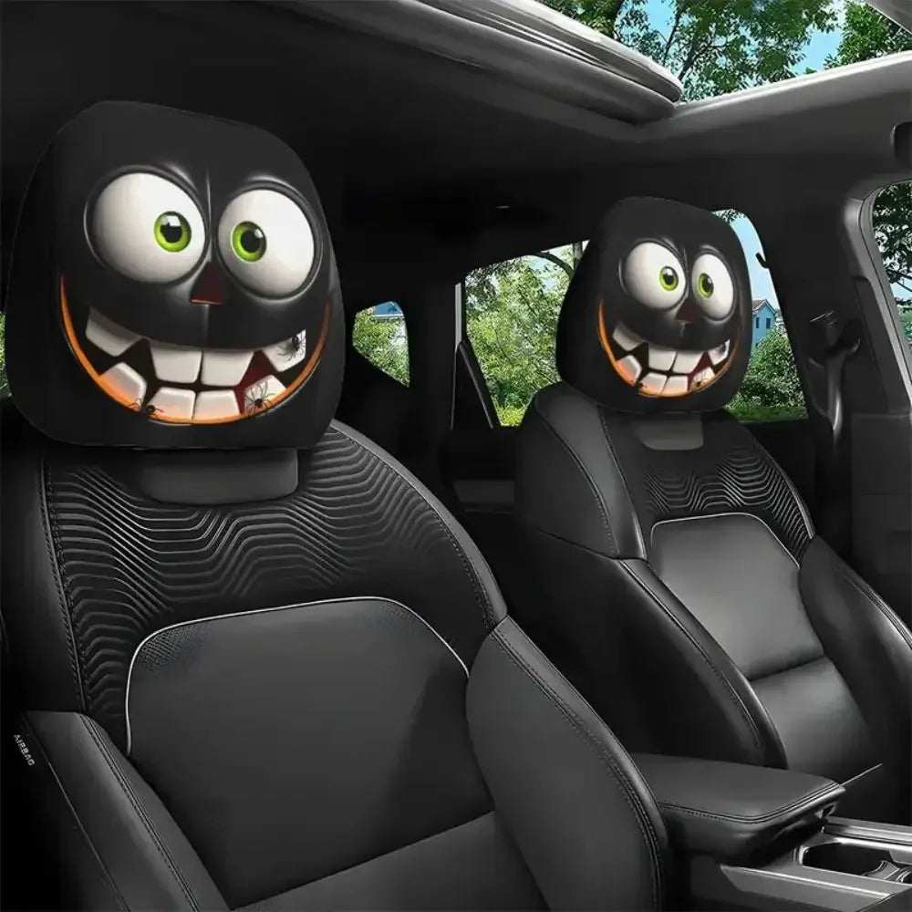 2Pcs Universal Car Seat Cover with black cartoon monster faces, large white eyes, green pupils and grinning teeth