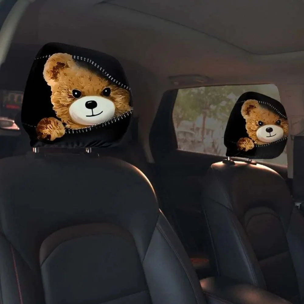 2Pcs Universal Car Seat Cover in black fabric, featuring a tan cartoon teddy bear face with a white muzzle on headrests