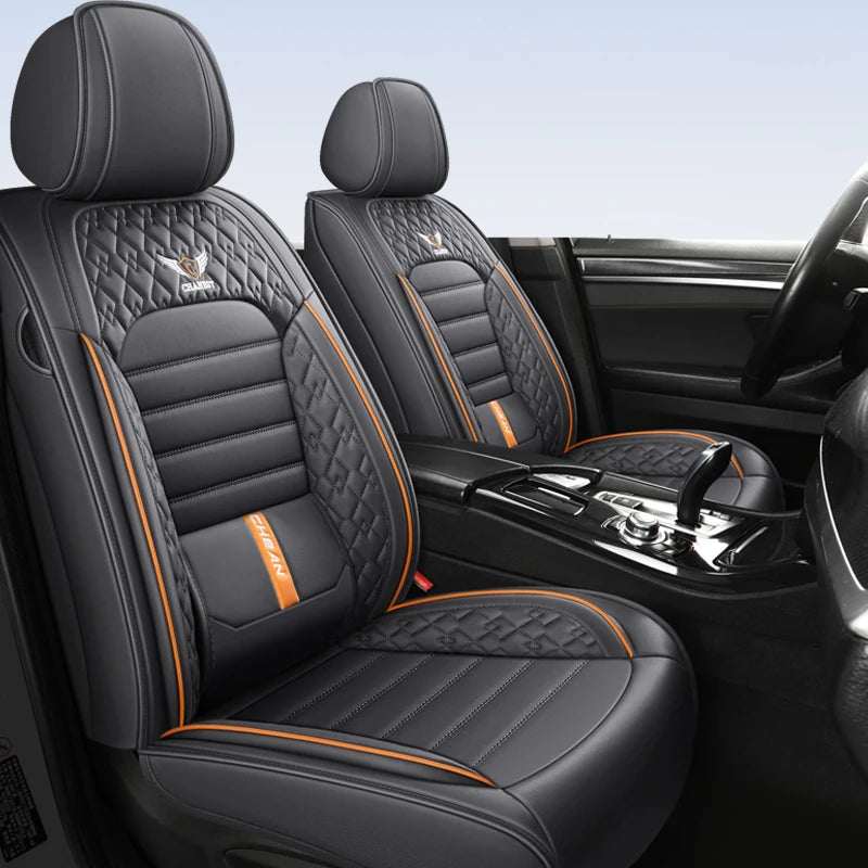 5-Seat Universal Car Seat Cover in black leather with quilted diamond panels, ribbed cushions and orange piping