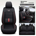 5-Seat Universal Car Seat Cover in black artificial leather with quilted diamond panels, ribbed cushions and red piping