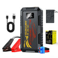 6000A Peak Car Jump Starter in black with digital display, red and yellow graphics, jumper clamps, USB cable and storage pouch