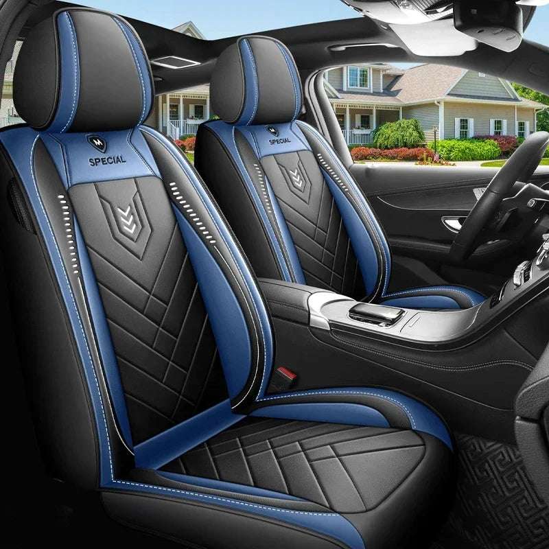 All inclusive seat cover in black and blue leather with diamond-quilted panels, contrast stitching and fitted headrests