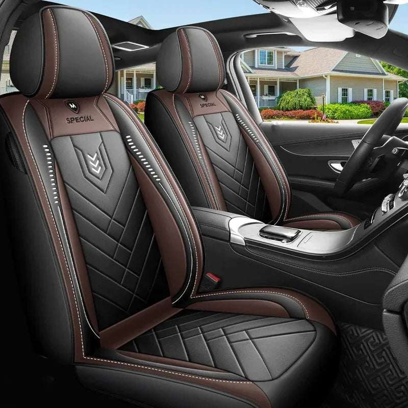 All inclusive seat cover in black and brown leather with quilted panels, contrast stitching and fitted headrests