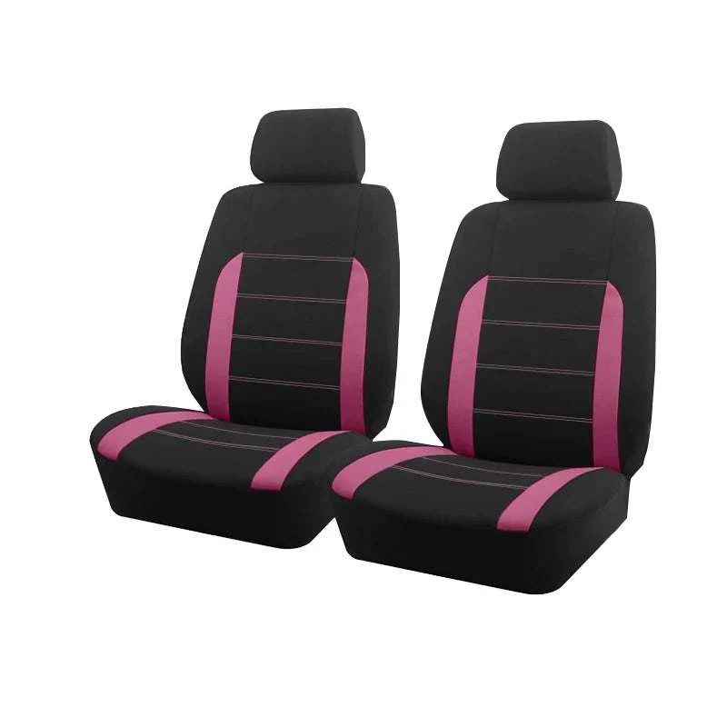 Car seat covers in black fabric with bright pink side panels and seat stripes, featuring matching headrest covers