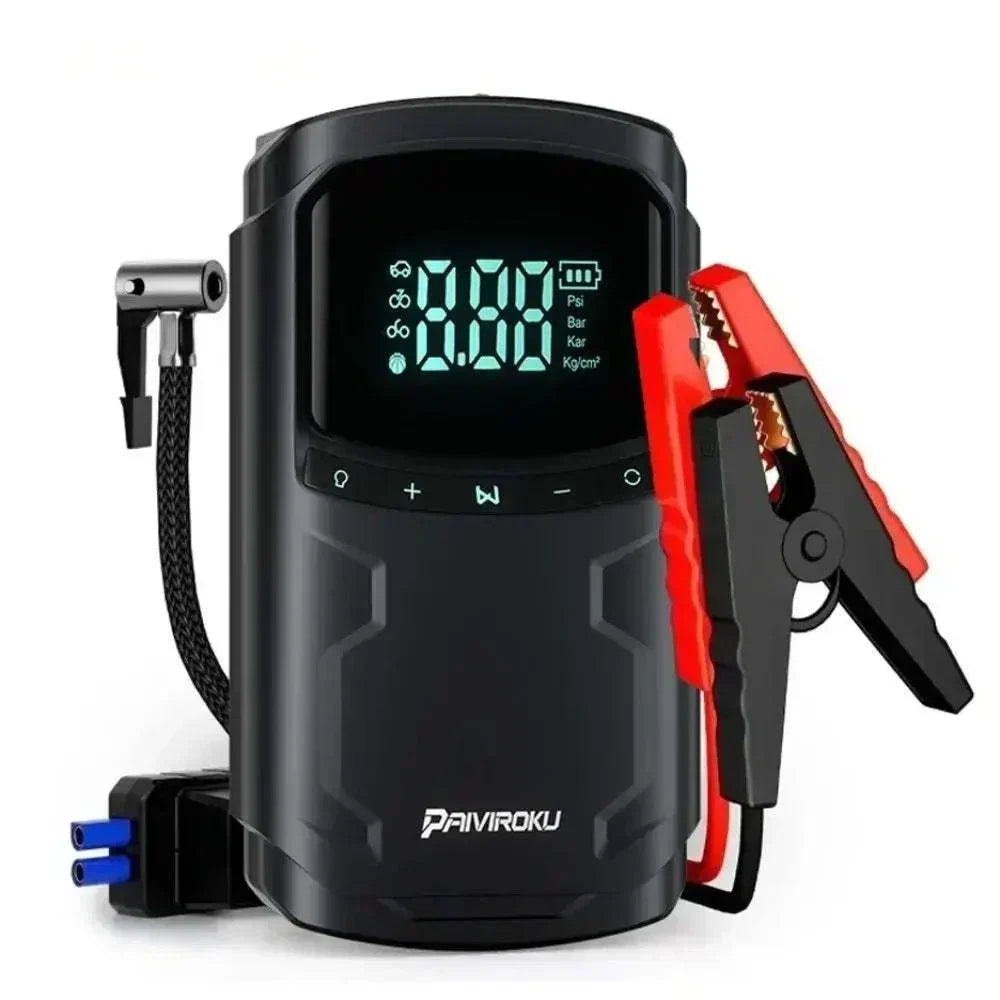 Car Jump Starter with Air Compressor, black portable unit with digital pressure display, attached red and black booster clamps