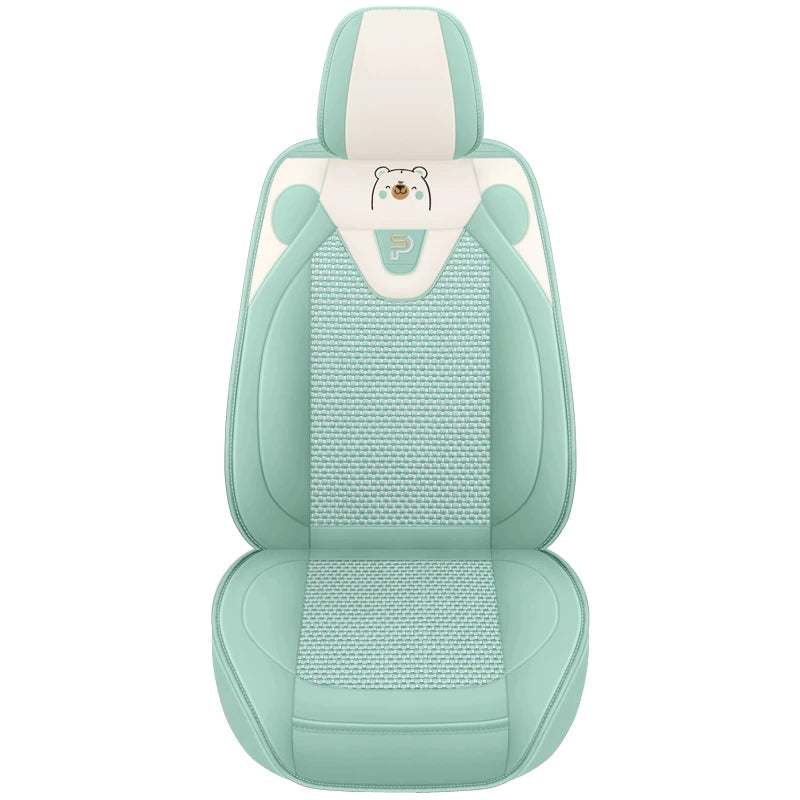 Five-Seat Car Seat Covers in mint green and cream artificial leather with textured center panels and a small cartoon bear accent