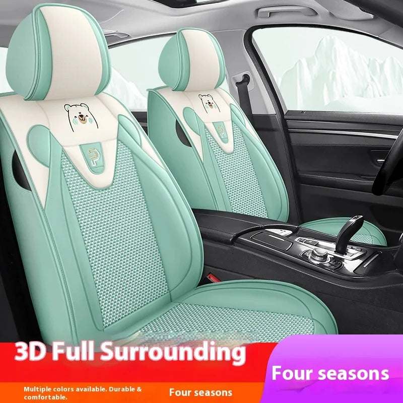 Five-Seat Car Seat Covers in mint green and cream artificial leather, with mesh panels, bear embroidery and padded bolsters