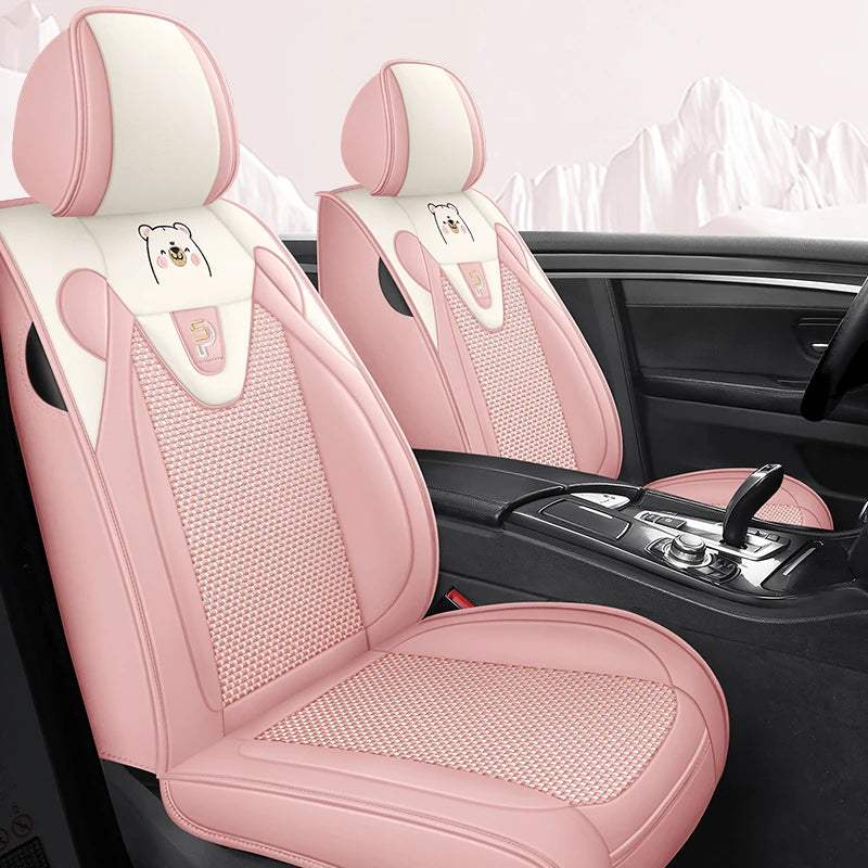 Five-Seat Car Seat Covers in pink and cream artificial leather, with textured mesh panels and cute bear embroidery
