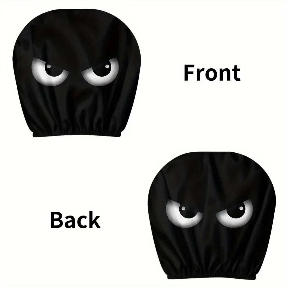 Car headrest cover in black polyester with a gathered elastic edge and printed white slanted eyes; Funny Slanted Eyes design