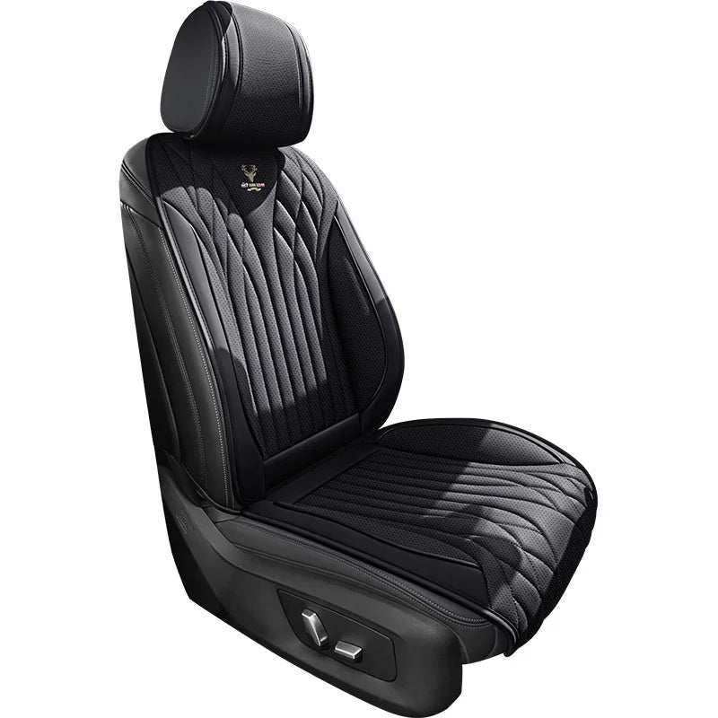 Universal Napa Leather car seat cushion in black artificial leather with quilted panels, ribbed stitching and padded headrest
