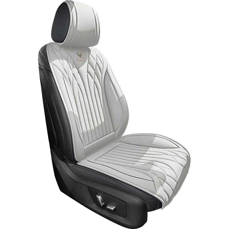 Car seat cover in white and black artificial leather with diamond quilting, ribbed panels and a matching headrest. Universal Napa Leather